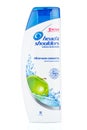 Moscow, Russia - July 22, 2020: Head & Shoulders Apple fresh anti-dandruff shampoo in a white plastic bottle with blue cap