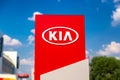 Moscow, Russia - July, 2021: Kia automobile dealership Sign against blue sky. Kia is a South Korean manufacturer of automobiles Royalty Free Stock Photo