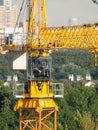 Liebherr construction crane, workman operator have a rest in cabin