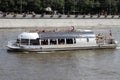 Little pleasure boat sails along the Moscow River.