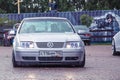 Moscow, Russia - July 06, 2019: Lowered silver Volkswagen Bora parked on the street. Inside are people who hide from the rain