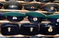 Military caps with Soviet cockades laid out on a souvenir counter in the city of Moscow