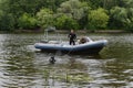 National Guard divers search for items at the bottom of the Moskva River