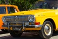 old Soviet car GAZ-24. Yellow car of Volga brand as a taxi