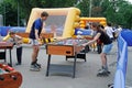 People playing table football in the park VDNKh in Moscow
