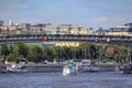 Moscow, Russia - July 30, 2018: Pleasure boats floating on a background of bridge over Moskva river on a sunny summer day Royalty Free Stock Photo