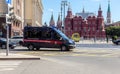 MOSCOW, RUSSIA - JULY 23, 2020: Police car of the Investigative Committee of Russia in front of the Kremlin towers of Red Square Royalty Free Stock Photo