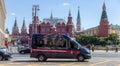 MOSCOW, RUSSIA - JULY 23, 2020: Police car of the Investigative Committee of Russia in front of the Kremlin towers of Red Square Royalty Free Stock Photo