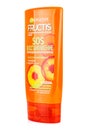 Moscow, Russia - July 22, 2020: Side view of GARNIER Fructis SOS recovery firming balm conditioner with amla oil for split ends