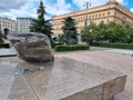 Moscow, Russia, July 19, 2022, Solovetsky stone and the building of the Federal Security Service of the Russian Federation.