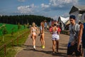 MOSCOW, RUSSIA - JULY 27, 2019: Two sexy women in bikini at JohnCalliano hookah fest.