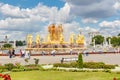 Moscow, Russia - July 22, 2019: View of fountain Friendship of Peoples in VDNH park in Moscow against lawn with green grass and Royalty Free Stock Photo