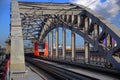 View to the Luzhniky stadium through the Cast iron spans of the Luzhnetsky bridge