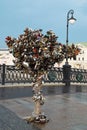 Moscow, Russia - July 17, 2008: Wedding locks on a metal tree on Luzhkov bridge in Moscow