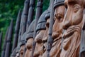 Moscow, Russia. July 17, 2021. Wooden sculpture Russian heroes with weapons in their hands and in helmets on their heads