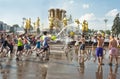 MOSCOW, RUSSIA - JULY 3: young people at Fountain friendship of people VDNKH Royalty Free Stock Photo