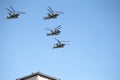 MOSCOW, RUSSIA - June 24,2020. An air parade of military combat helicopters of Russian Air Force fly in skies of Moscow over