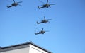 MOSCOW, RUSSIA - June 24,2020. An air parade of military combat helicopters of Russian Air Force fly in skies of Moscow over