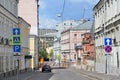 Moscow, Russia, June, 12, 2017. Black car in Podkolokolny lane in cloudy weather