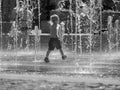 Moscow. Russia. June 19, 2019. Children bathing in a refreshing spray of the city fountain on a hot summer day