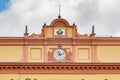 Moscow, Russia - June 02, 2019: Clock under roof on the facade of building of KGB on Lubyanka Square in Moscow. Architecture of Royalty Free Stock Photo