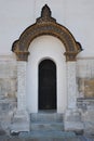 The door with the stone arches of the Archangel Cathedral on Cathedral Square in the Kremlin in Moscow Royalty Free Stock Photo