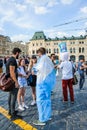 The 2018 FIFA World Cup. Argentine fans in the hat of a fan in the form of a duck with a flag of Argentina on Red square Royalty Free Stock Photo