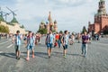 The 2018 FIFA World Cup. Argentine fans in striped white-blue t-shirts in colors of the flag of Argentina go on Red square Royalty Free Stock Photo