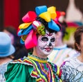 A National house for Mexican fans in Gostiny Dvor. Celebration of the Day of the Dead. Girl dressed as the goddess of death Royalty Free Stock Photo