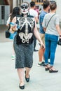 Celebration of the Day of the Dead. Girl in a skeleton costume and makeup as skull Royalty Free Stock Photo