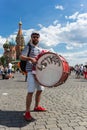 Football fan of Poland with a drum on Red Square in Moscow Royalty Free Stock Photo