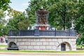 Moscow, Russia - June 02, 2019: Fountain Vitali on Revolution Square in Moscow against green trees at sunny day Royalty Free Stock Photo