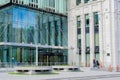 Glass entrance to a modern office building, white collars are going out Royalty Free Stock Photo