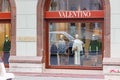 Moscow, Russia - June 02, 2019: Glass showcase with mannequins on the facade of Valentino boutique in the center of Moscow