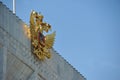 The golden coat of Arms of Russia on the State Kremlin Palace in Moscow
