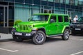 Green Jeep Wrangler Unlimited 4x4 SUV car parked on the street in the city Royalty Free Stock Photo