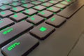 Moscow, Russia - June 04, 2019: green Windows button on a keyboard with lighting. Close up of shift, ctrl, alt