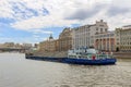 Moscow, Russia - June 21, 2018: Loaded barge floating on Moskva river in the center of Moscow on a sunny summer day