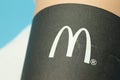 Moscow, Russia - 1 June 2020: McDonalds logo on coffee cup close-up , Illustrative Editorial
