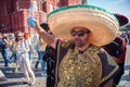 Mexican football fans on red Square in Moscow. Famous Mexican sombreros and ponchos. Football world Cup. Royalty Free Stock Photo