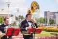 New Life Brass band classical quintet of brass wind musical instruments, orchestra performs music, man musician plays sousaphone,