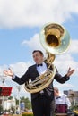 New Life Brass band, wind musical instrument player, orchestra performs music, man musician plays sousaphone, helicon tube