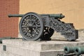 An old bronze cannon on the territory of the Kremlin in Moscow Royalty Free Stock Photo