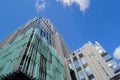 Moscow, Russia, June 2020: Part of a tall modern office building made of glass and concrete against a cloudy sky Royalty Free Stock Photo