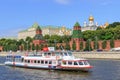 Moscow, Russia - June 21, 2018: Pleasure boat floating on Moskva river near Moscow Kremlin on a sunny summer day Royalty Free Stock Photo