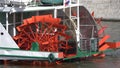 MOSCOW , RUSSIA, June 10, 2021: Red Riverboat Paddle Wheel in a River with Treeson June 10, 2021 in Moscow, Russia Royalty Free Stock Photo