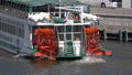 MOSCOW , RUSSIA, June 10, 2021: Red Riverboat Paddle Wheel in a River with Treeson June 10, 2021 in Moscow, Russia Royalty Free Stock Photo