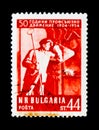 Bulgaria postage stamp shows steel worker, 50 years anniversary of trade unions, circa 1954