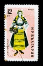 Bulgaria postage stamp shows woman in folk costume Kyustendil, circa 1961