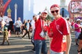 MOSCOW, RUSSIA - JUNE 2018: A Swiss football fan in red uniforms smiles at a fan festival during the FIFA World Cup Royalty Free Stock Photo